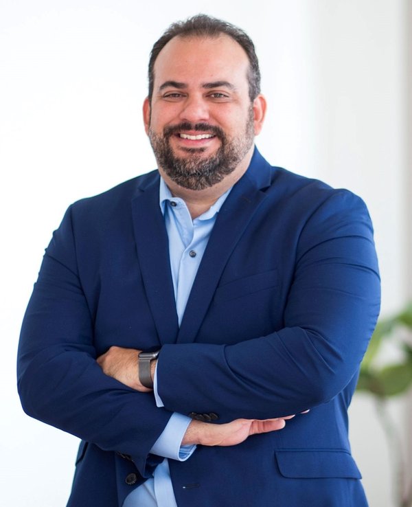 Carlos Olivares — Broker-Associate, BHHS EWM Realty Miami, independent buyer agent for Delano Residences